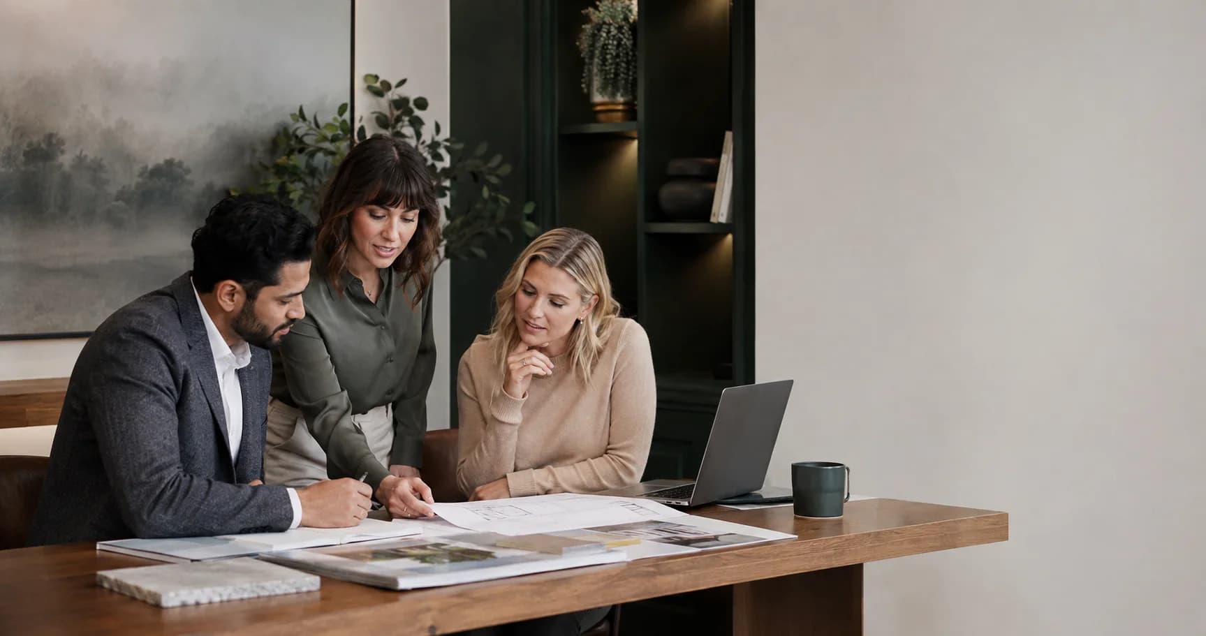 Property agency team reviewing portfolio operations together